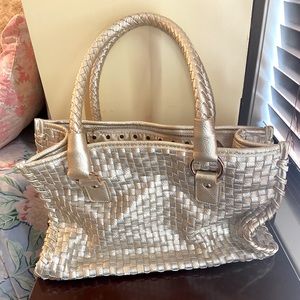 CJ banks, gold woven purse